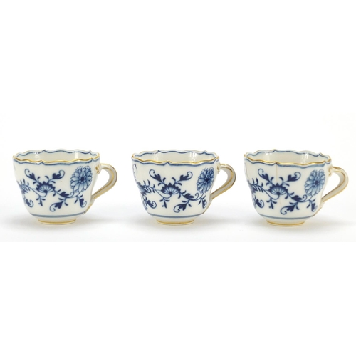 93 - Set of six Meissen fluted cups and saucers, each hand painted in the Blue Onion pattern, crossed swo... 