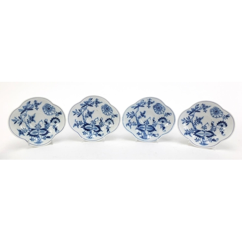 91 - Five Meissen demitasse cups and four saucers, each hand painted in the Blue Onion pattern, crossed s... 