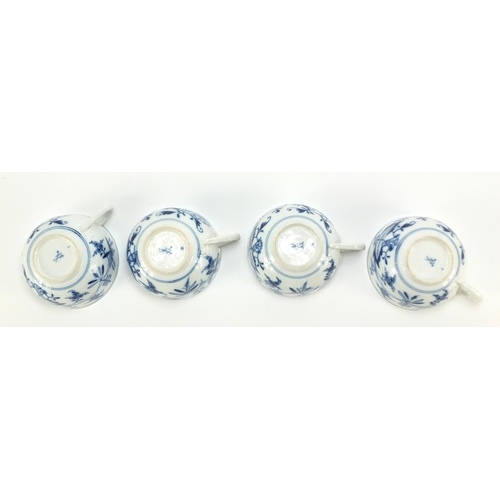 92 - Four Meissen cups and saucers hand painted in the blue onion pattern, crossed sword marks to the bas... 