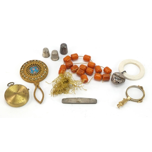 298 - Objects including a silver flanked folding pocket knife, silver thimbles, gilt metal lorgnettes, com... 