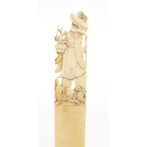 411 - Chinese carved ivory page turner, 22cm in length