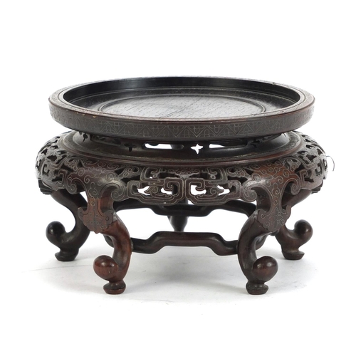 372 - Good Chinese carved hardwood stand with foliate wire inlay, 11cm high x 16.5cm in diameter