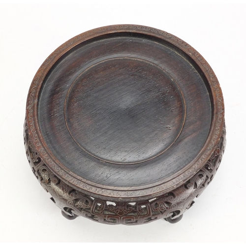 372 - Good Chinese carved hardwood stand with foliate wire inlay, 11cm high x 16.5cm in diameter