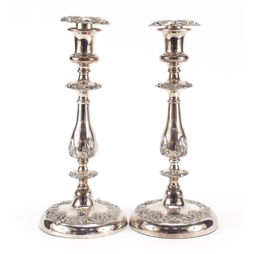 506 - Pair of classical silver plated candlesticks, each 28.5cm high