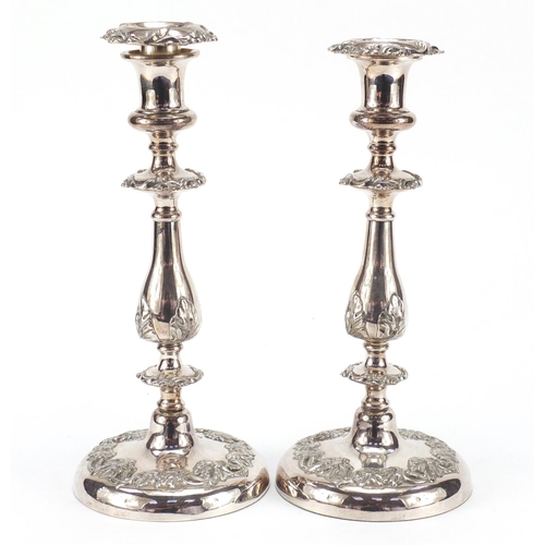 506 - Pair of classical silver plated candlesticks, each 28.5cm high