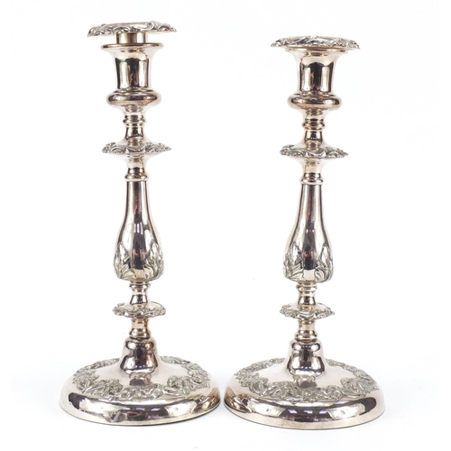 506 - Pair of classical silver plated candlesticks, each 28.5cm high