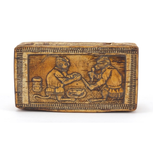 340 - 19th century snuff box decorated with two monkeys and flowers, 10cm wide