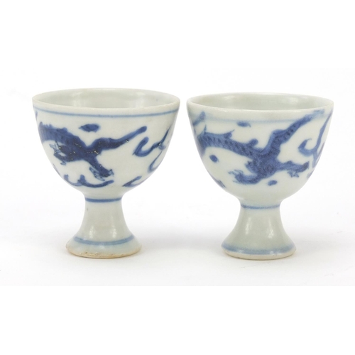 517 - Pair of Chinese blue and white porcelain stem cups from the Hatcher junk with paper labels and Sunda... 