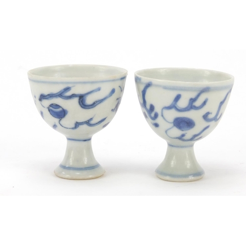 517 - Pair of Chinese blue and white porcelain stem cups from the Hatcher junk with paper labels and Sunda... 