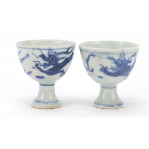 517 - Pair of Chinese blue and white porcelain stem cups from the Hatcher junk with paper labels and Sunda... 