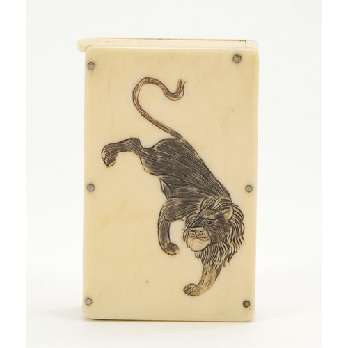 339 - Early 20th century ivory vesta case carved with two Japanese lions, 6.2cm high