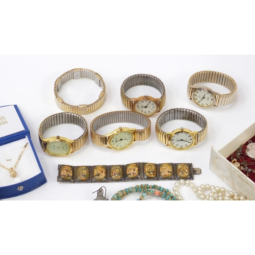 1558 - Vintage and later costume jewellery arranged in a jewellery box including silver rings, coral, Persi... 