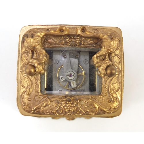 345 - Charles Frodsham style miniature gilt carriage clock with figural pillars and circular dial having A... 