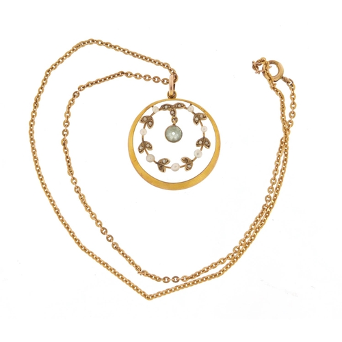 308 - Edwardian 9ct gold aquamarine and seed pearl pendant, 2.5cm in diameter on a 9ct gold necklace, 38cm... 