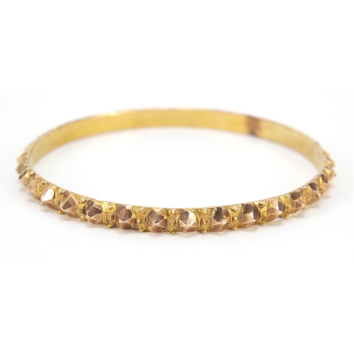 48 - Unmarked gold bangle, (tests as 9ct gold) 6.5cm in diameter, 18.4g