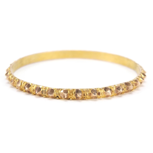 235 - Unmarked gold bangle, (tests as 9ct gold) 6.5cm in diameter, 19.2g