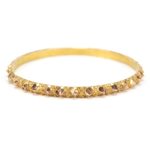 235 - Unmarked gold bangle, (tests as 9ct gold) 6.5cm in diameter, 19.2g