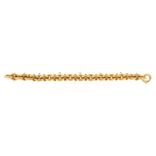 305 - 18ct gold chain link charm bracelet, 21cm in length, 26.5g