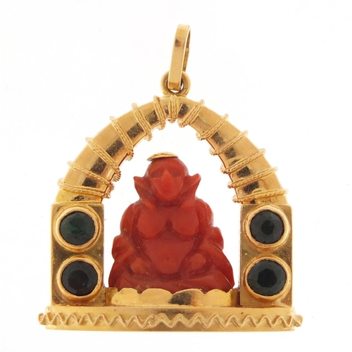 79 - Large Italian 18ct gold pendant charm with a carved coral Chinese Buddha and set with green stones, ... 