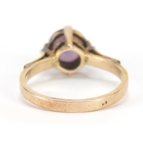 135 - Unmarked gold solitaire ring, possibly alexandrite, (tests as 9ct gold) size M, 2.9g