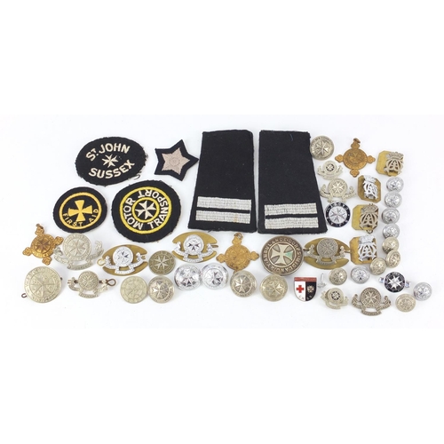 604 - St John Ambulance memorabilia including badges, buttons and cloth patches