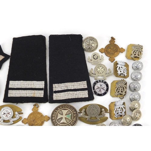 604 - St John Ambulance memorabilia including badges, buttons and cloth patches