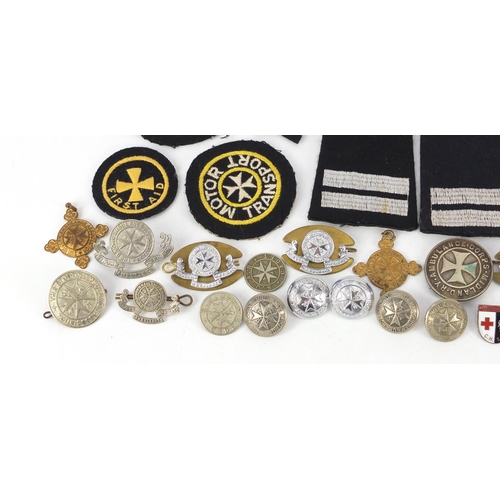 604 - St John Ambulance memorabilia including badges, buttons and cloth patches