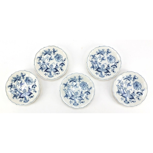 461 - Five Meissen fluted cups and saucers hand painted in the Blue Onion pattern, crossed sword marks to ... 