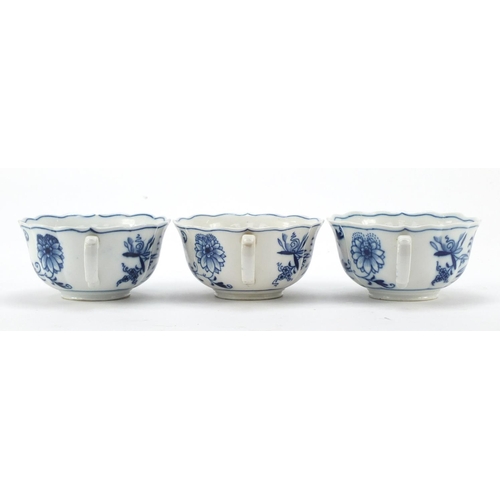 461 - Five Meissen fluted cups and saucers hand painted in the Blue Onion pattern, crossed sword marks to ... 