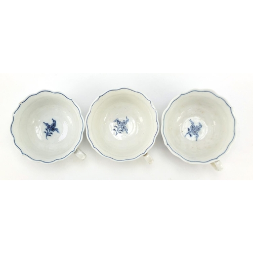 461 - Five Meissen fluted cups and saucers hand painted in the Blue Onion pattern, crossed sword marks to ... 