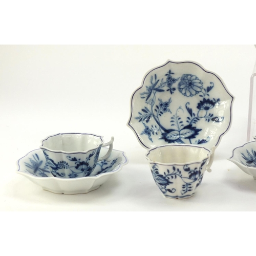 462 - Eight Meissen coffee cups and saucers, hand painted in the Blue Onion pattern, crossed sword marks t... 