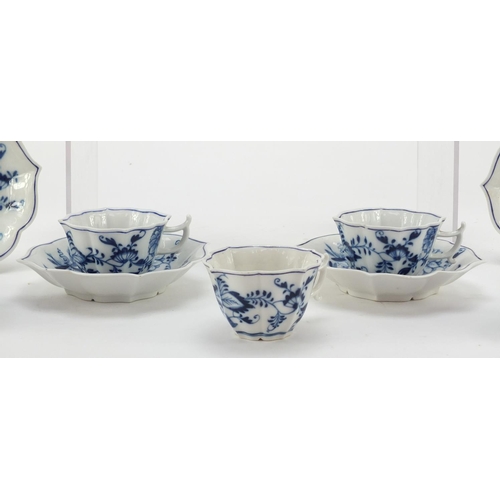 462 - Eight Meissen coffee cups and saucers, hand painted in the Blue Onion pattern, crossed sword marks t... 