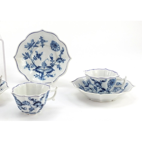 462 - Eight Meissen coffee cups and saucers, hand painted in the Blue Onion pattern, crossed sword marks t... 