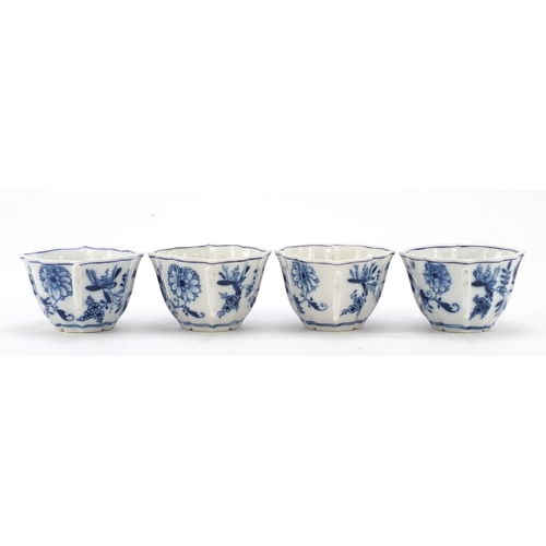 462 - Eight Meissen coffee cups and saucers, hand painted in the Blue Onion pattern, crossed sword marks t... 