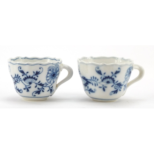 464 - Five Meissen fluted cups with saucers and two additional saucers each, each hand painted in the Blue... 