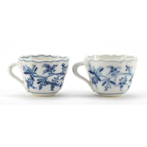 464 - Five Meissen fluted cups with saucers and two additional saucers each, each hand painted in the Blue... 