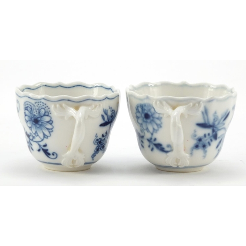 464 - Five Meissen fluted cups with saucers and two additional saucers each, each hand painted in the Blue... 