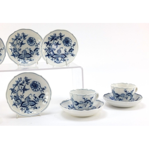 464 - Five Meissen fluted cups with saucers and two additional saucers each, each hand painted in the Blue... 