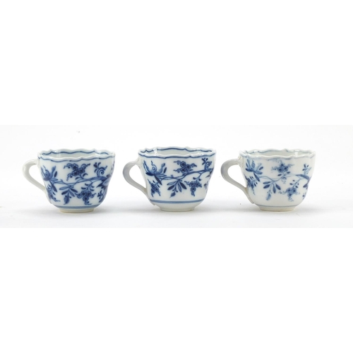 464 - Five Meissen fluted cups with saucers and two additional saucers each, each hand painted in the Blue... 