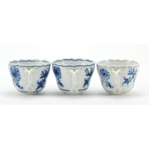 464 - Five Meissen fluted cups with saucers and two additional saucers each, each hand painted in the Blue... 