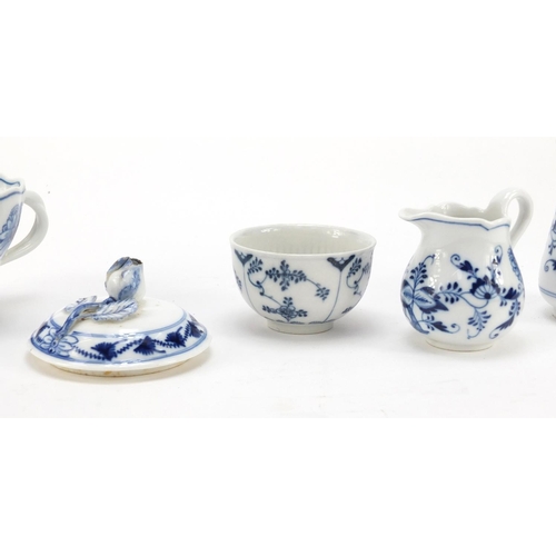 463 - Meissen porcelain comprising oversized cup, milk bowl, sugar bowl, flower vase and two lids, each ha... 