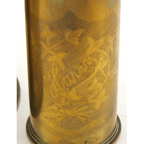 911 - British military World War I trench art champagne bucket and a jug, the largest 21cm high