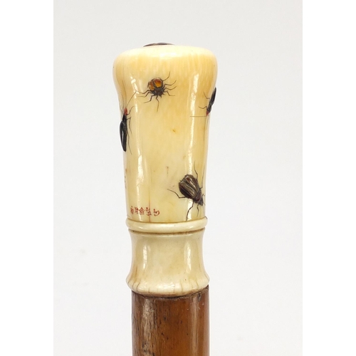 74 - Malacca walking stick with a Japanese Shibayama pommel inlaid with insects, carved with character ma... 