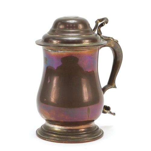 116 - 18th century copper tankard inset with a 1723 silver shilling, 20cm high