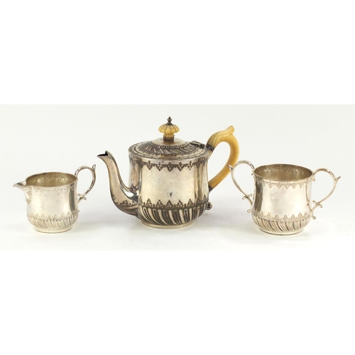 81 - Victorian silver tea for one tea service by Mappin & Webb, the teapot with ivory handle and knopp, S... 