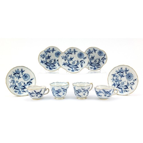 94 - Meissen porcelain hand painted in the blue onion pattern comprising two fluted cups with saucers, tw... 