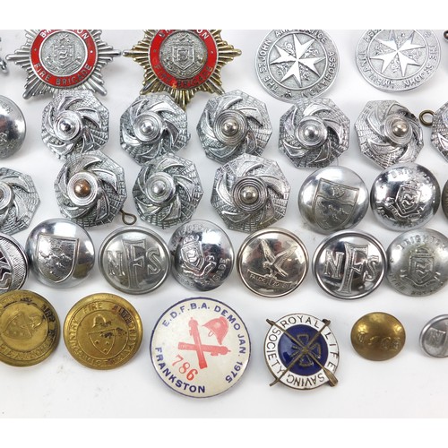 602 - Collection of vintage and later fire and police badges, pips and helmet plates