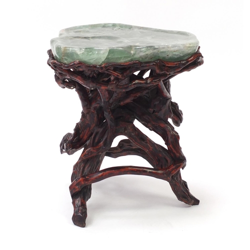 258 - Chinese fluorite specimen tea table raised on a gnarled root base, 54.5cm H x 51cm W x 46cm D