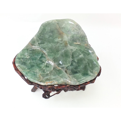 258 - Chinese fluorite specimen tea table raised on a gnarled root base, 54.5cm H x 51cm W x 46cm D