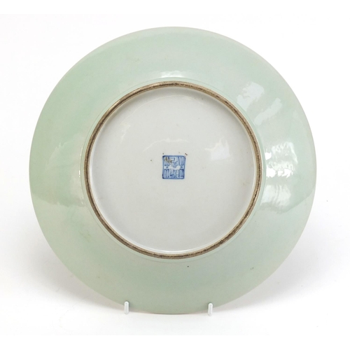 450 - Chinese celadon glaze porcelain plate hand painted in the famille rose palette with bats amongst pea... 